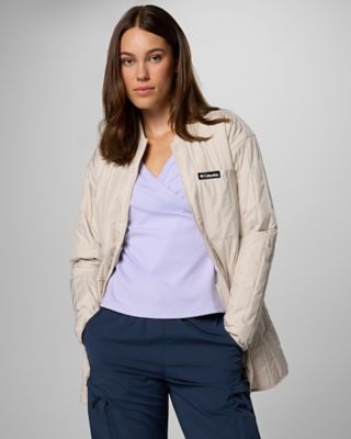A woman in an outdoor outfit.