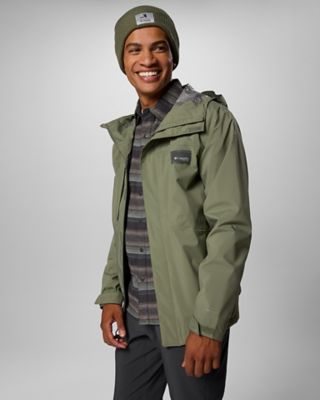 Man in a green rain jacket.