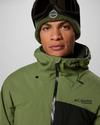 A man in a green ski jacket.