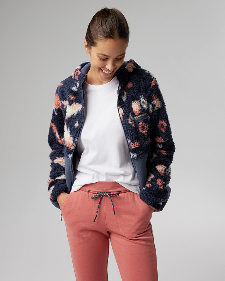 Outfit 4: Plush sherpa fleece in a bold southwestern-style print, white tee, coral pants.