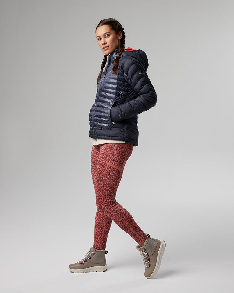 Outfit 10: Blue puffer jacket with gold thermal-reflective lining, coral pink printed leggings, tan boots.