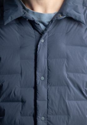 Detail shot of the Men's Super/DS™ Stretchdown Climb Shacket front button down, logo and fabric details