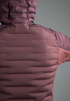 Detail shot of the Stretchdown™ Hybrid Hoody in the studio being actively stretched out