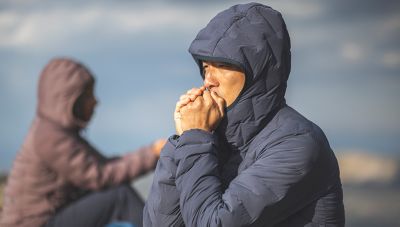 MHW ambassador Cody Kaemmerlen warms up in the Super/DS™ Stretchdown Hooded Jacket.