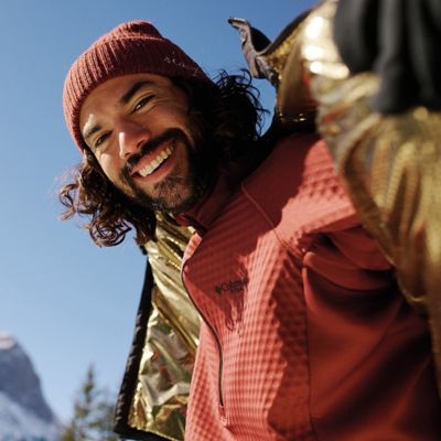 A man wearing a Omni Heat Infinity jacket.