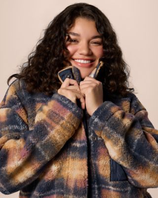A woman wearing a warm and cozy fleece.