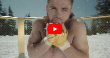 Video still and play button for World Champion Warmth Ad spot
