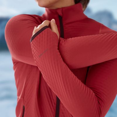 Model stretching to show the four way stretch fabric.
