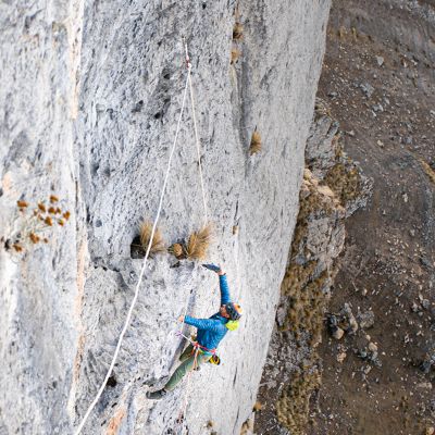 Setting up a route in the Andes, wearing the Ghost Whisperer Jacket