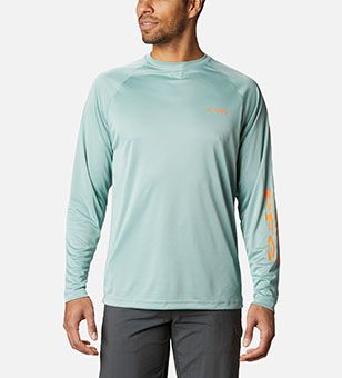 A man in a long sleeve PFG shirt. 