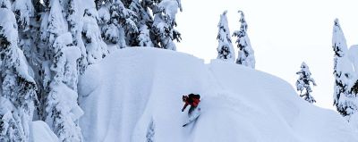 skiing in deep powder in the backcountry