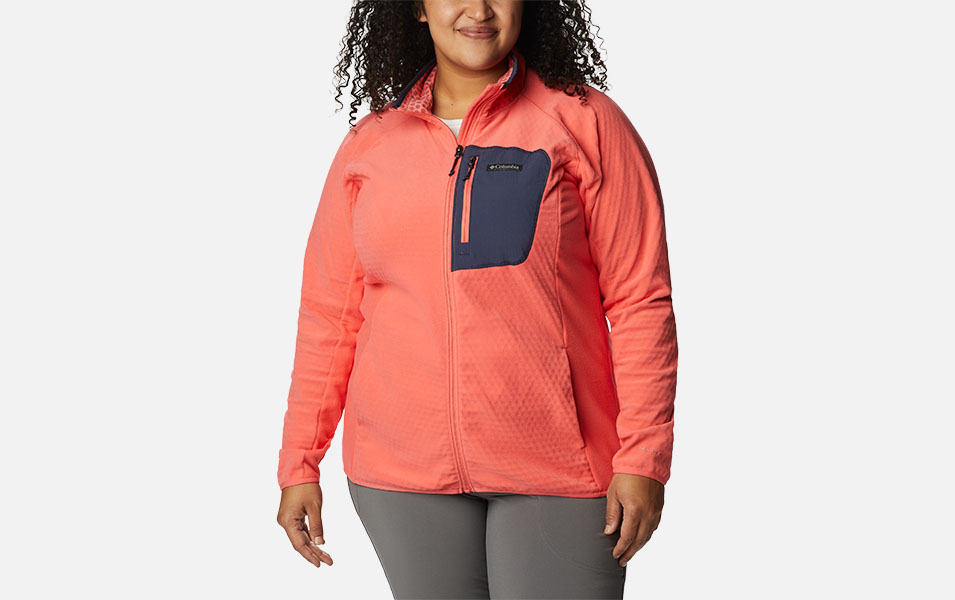 A product image of a woman wearing Columbia Sportswear’s Outdoor Tracks Full Zip Fleece Jacket against a white background. 