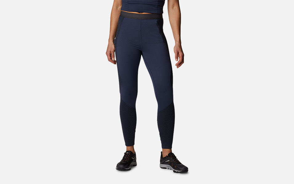 A product image of a woman wearing Columbia Sportswear’s Titan Pass Leggings against a white background.  

​ 