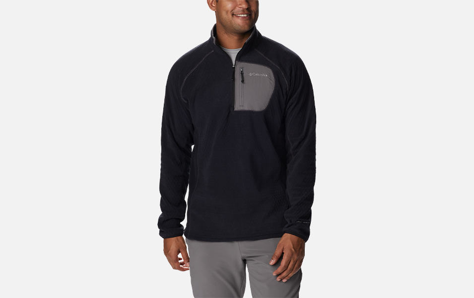 A product image of a man wearing Columbia Sportswear’s Outdoor Tracks Half Zip Fleece Pullover against a white background. 