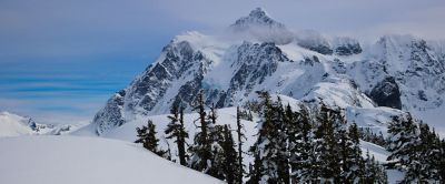 Snowy mountain peaks on a sunny day. 