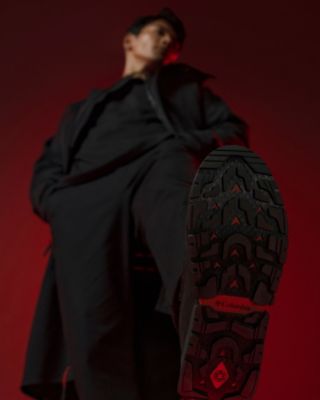 Man wearing a Vader boot