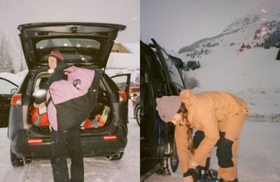 Getting ready to ski in the parking lot of a resort.