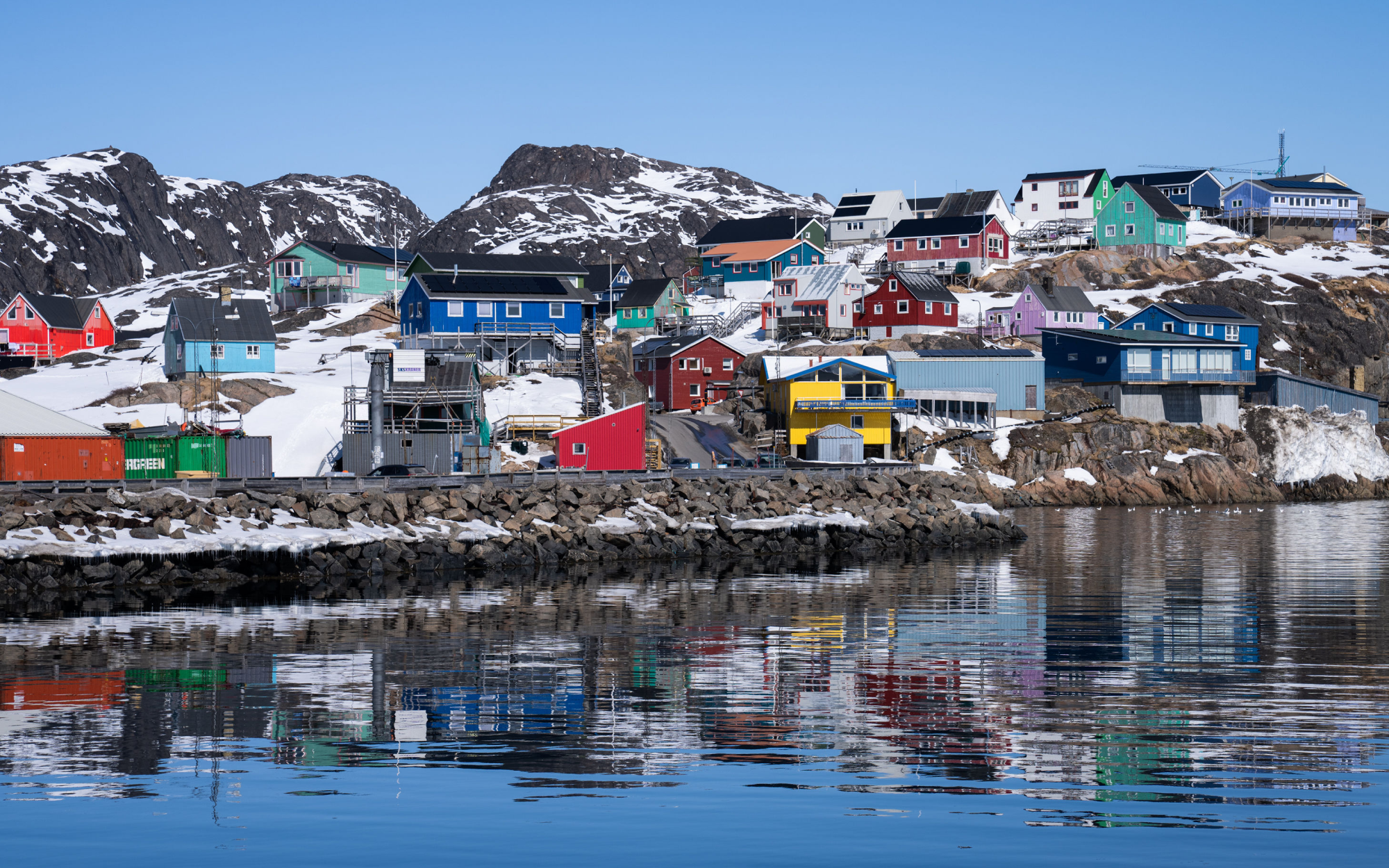 Landscape image of a town in Greenland.