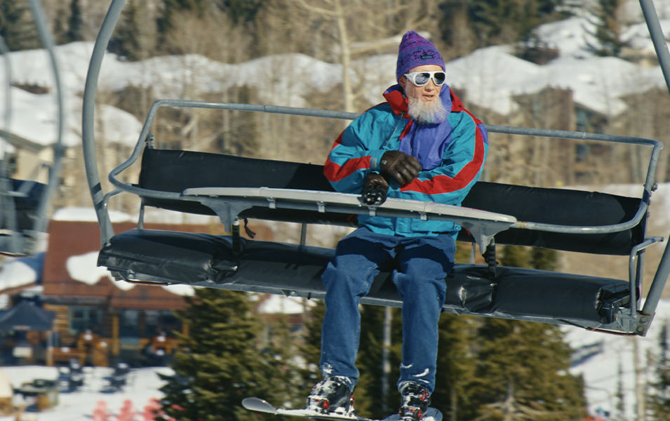 Hotdog Hans is pictured on a chairlift in Snowmass wearing a blue vintage Columbia Sportswear jacket. 