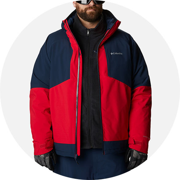 Man in a red and blue ski jacket.