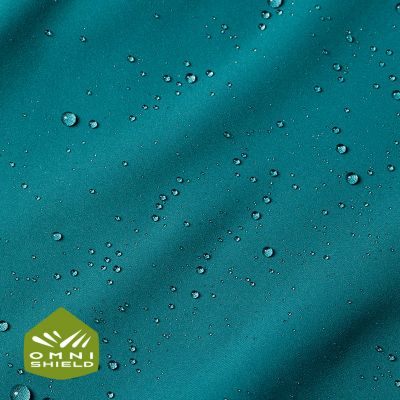 Close-up of fabric with the Omni Shield logo in the bottom left and a graphic showing how moisture beads on the fabric's surface.