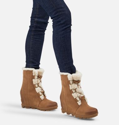 joan of arctic wedge genuine shearling bootie