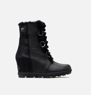 joan of arctic wedge genuine shearling bootie