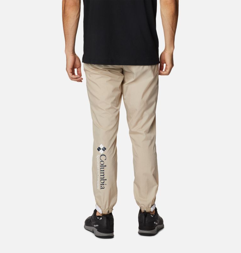 Men's Riptide Wind Pant, Color: Ancient Fossil, White, Collegiate Navy, image 2