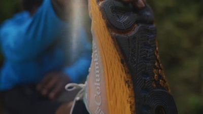 Man wearing Columbia running shoes. 