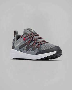 A kids' grey sneaker with red lace accents.