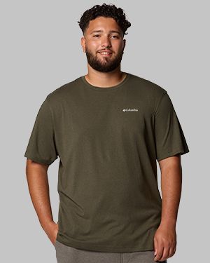 A man wearing a dark green t-shirt.