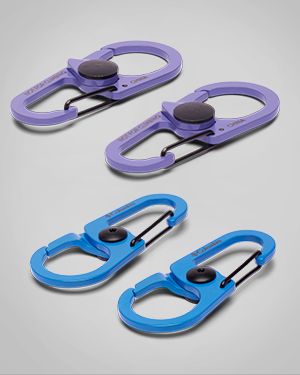 A pair of purple and blue carabiners.
