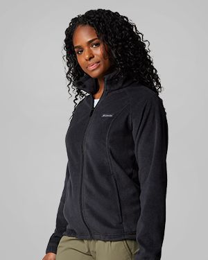 A woman wearing a black fleece zip-up.