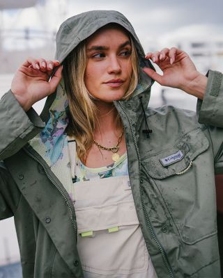 A woman in trendy outdoor clothes.