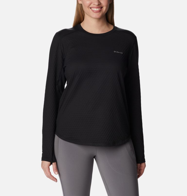 Woman in gray and black long sleeve shirt and black leggings