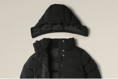 Removable hood separated from collar of jacket.