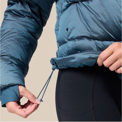 Model adjusting drawcord hem.