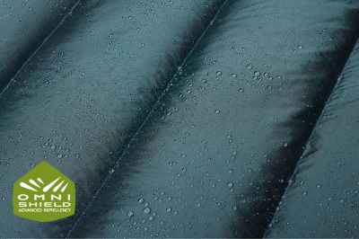 Close up of fabric with water beading on it.