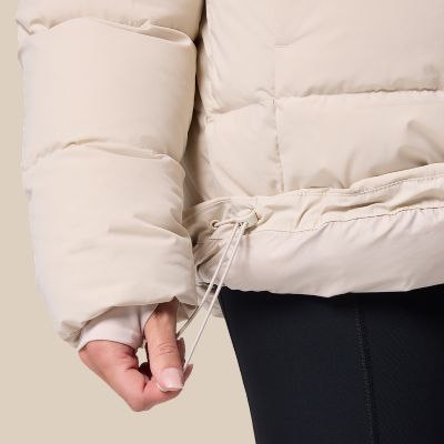 Model adjusting drawcord hem.