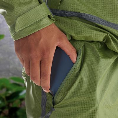 Model putting phone in hand pocket.