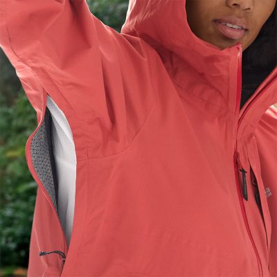 Model lifting their arm to reveal the zippered, breathable underarm vents.