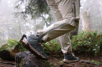 Model hopping over a log.