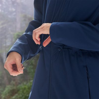 Close-up of a woman adjusting the waist
