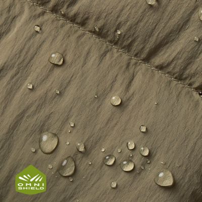 Close up of fabric with the Omni Shield logo in the bottom left and a graphic showing how moisture beads on the fabric's surface.