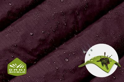 Close up of fabric with the Omni Shield logo in the bottom left and a graphic showing how moisture beads on the fabric's surface.