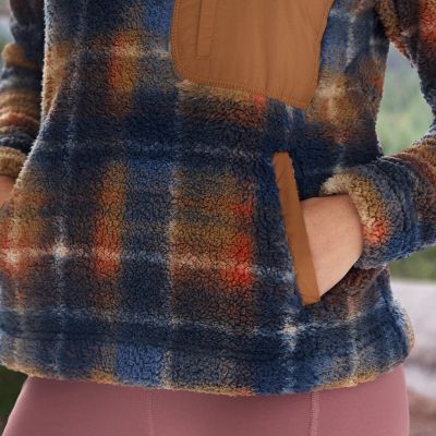 Model placing hand into pocket.