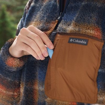 Model placing chapstick into the chest pocket.