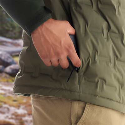 Close-up of a phone going into a pocket.
