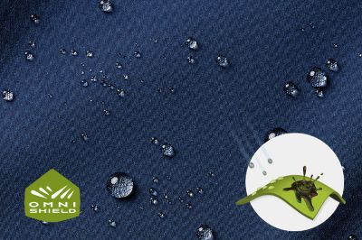 Close up of fabric with the Omni Shield logo in the bottom left and a graphic showing how moisture beads on the fabric's surface.