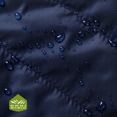 Close up of fabric with the Omni Shield logo in the bottom left and a graphic showing how moisture beads on the fabric's surface.